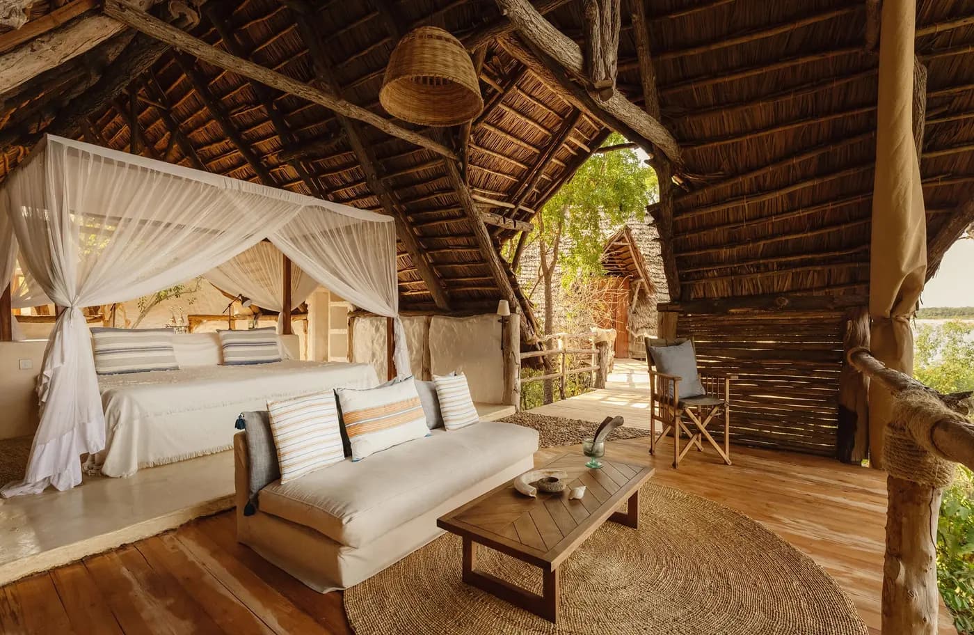 Open-fronted room with a canopy bed