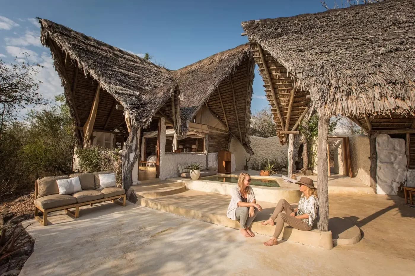 Thatched lodge buildings and terrace