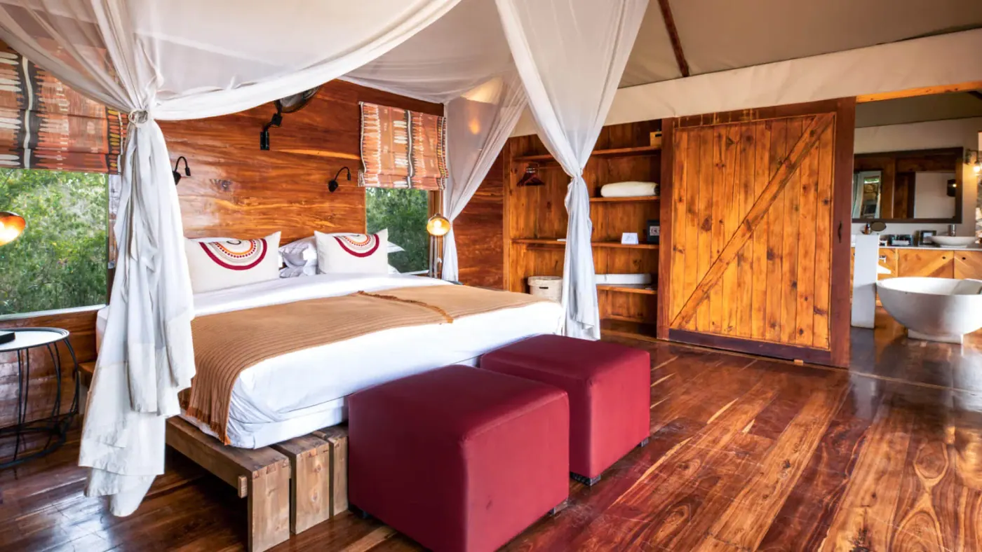 Bed with red ottomans