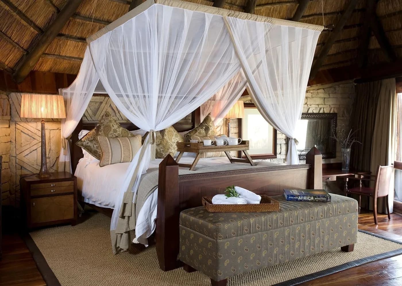 Villa bedroom with a canopy bed