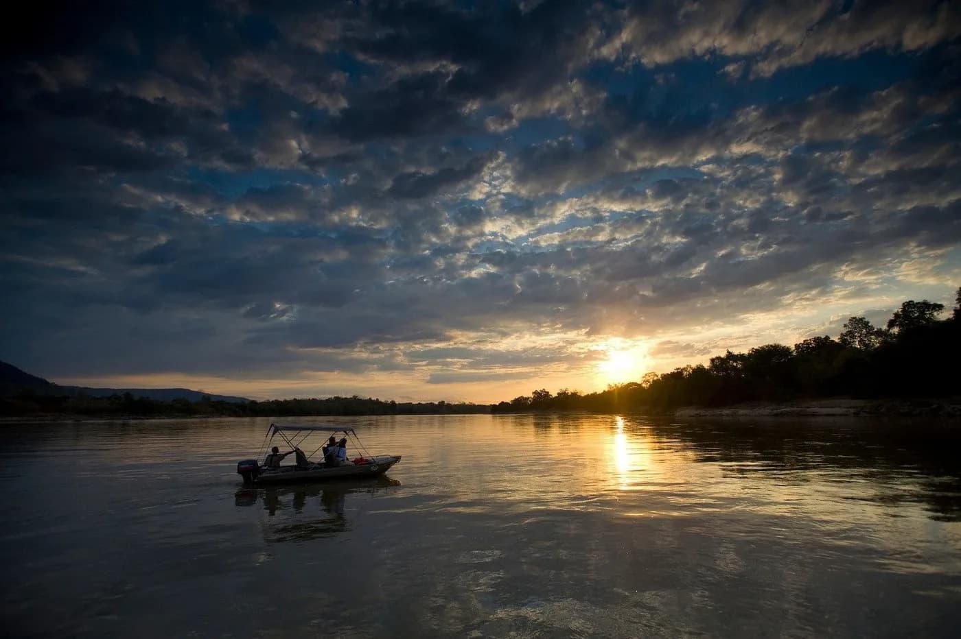 Boat on the river at sunset