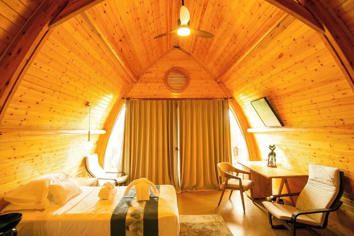 Chalet interior under the timber arch