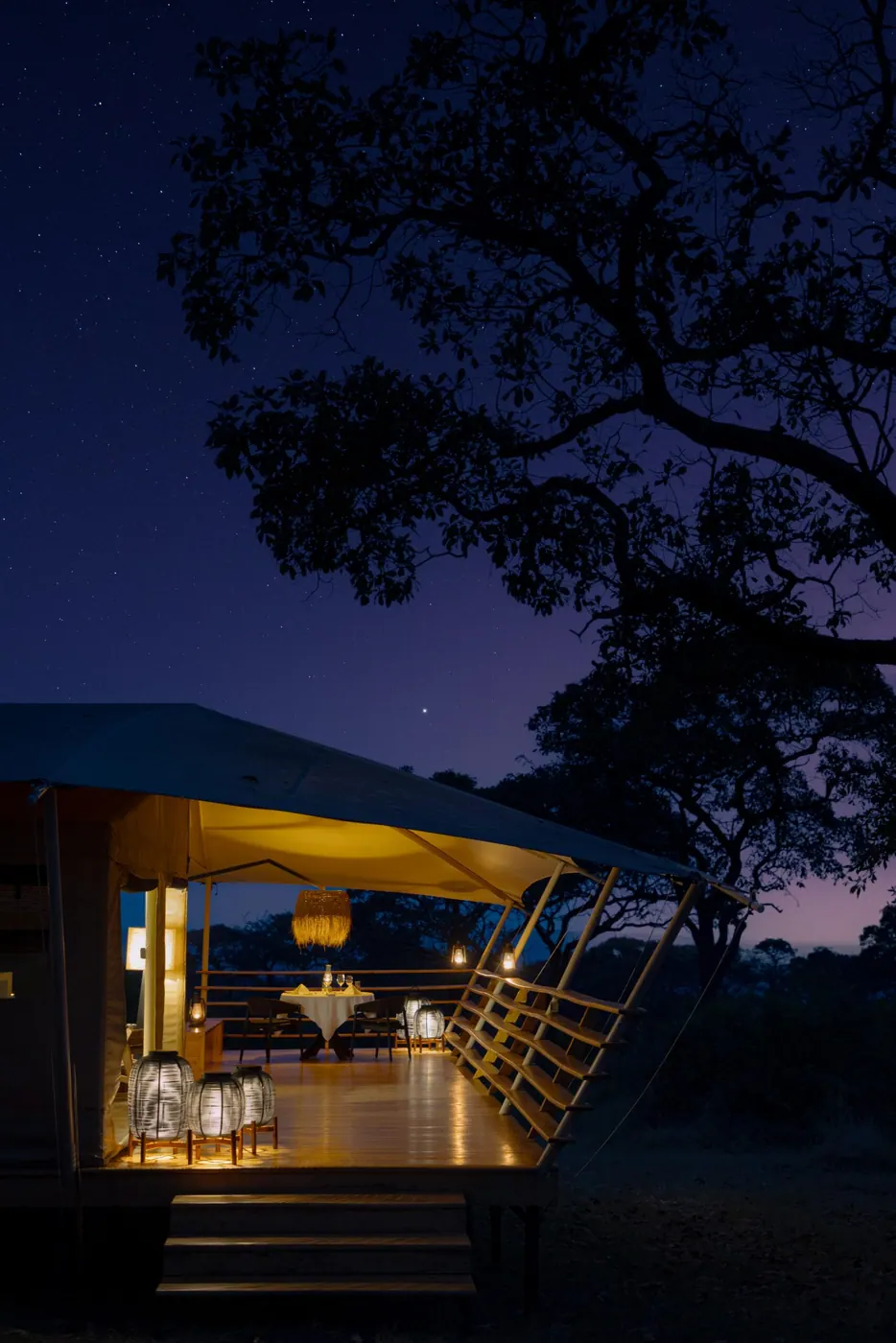 The camp lit at dusk