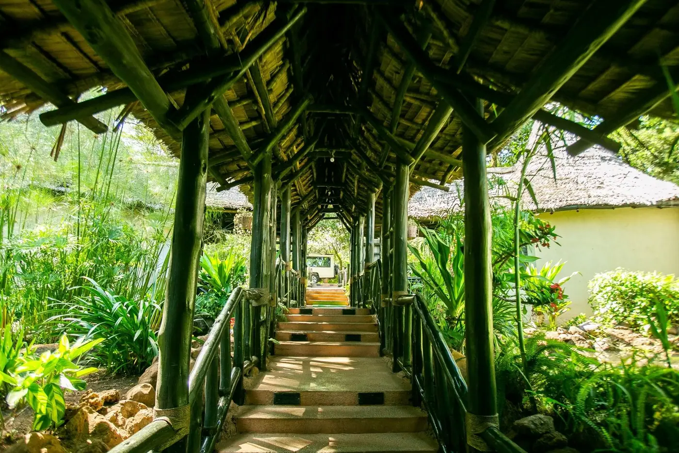 Painted colonnade through the gardens