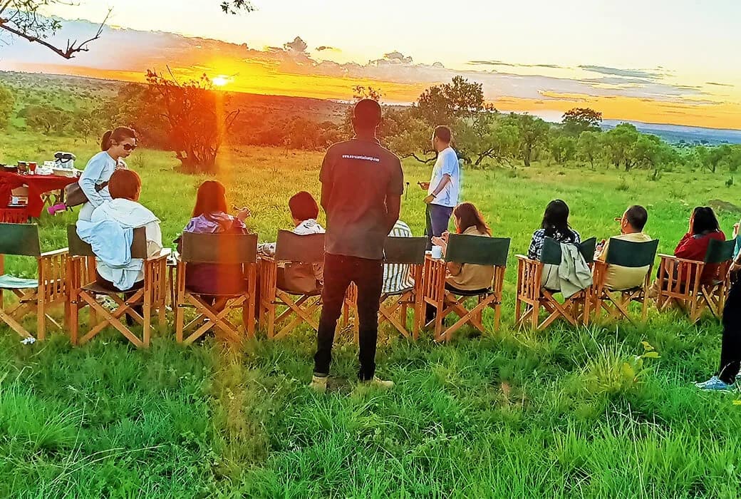 Guests gathering in the evening light