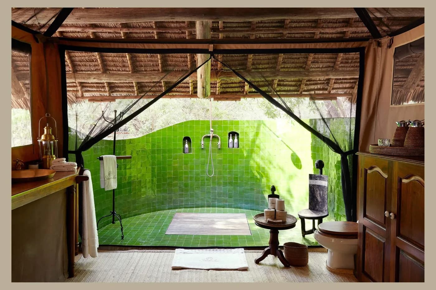 Open-air shower in green tile