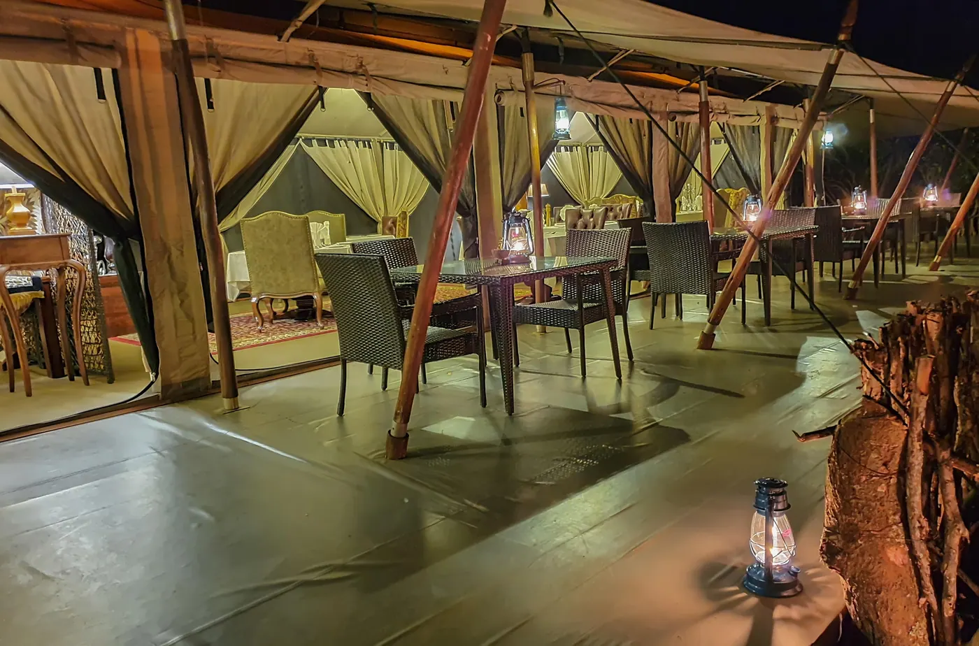 The mess tent by lantern light