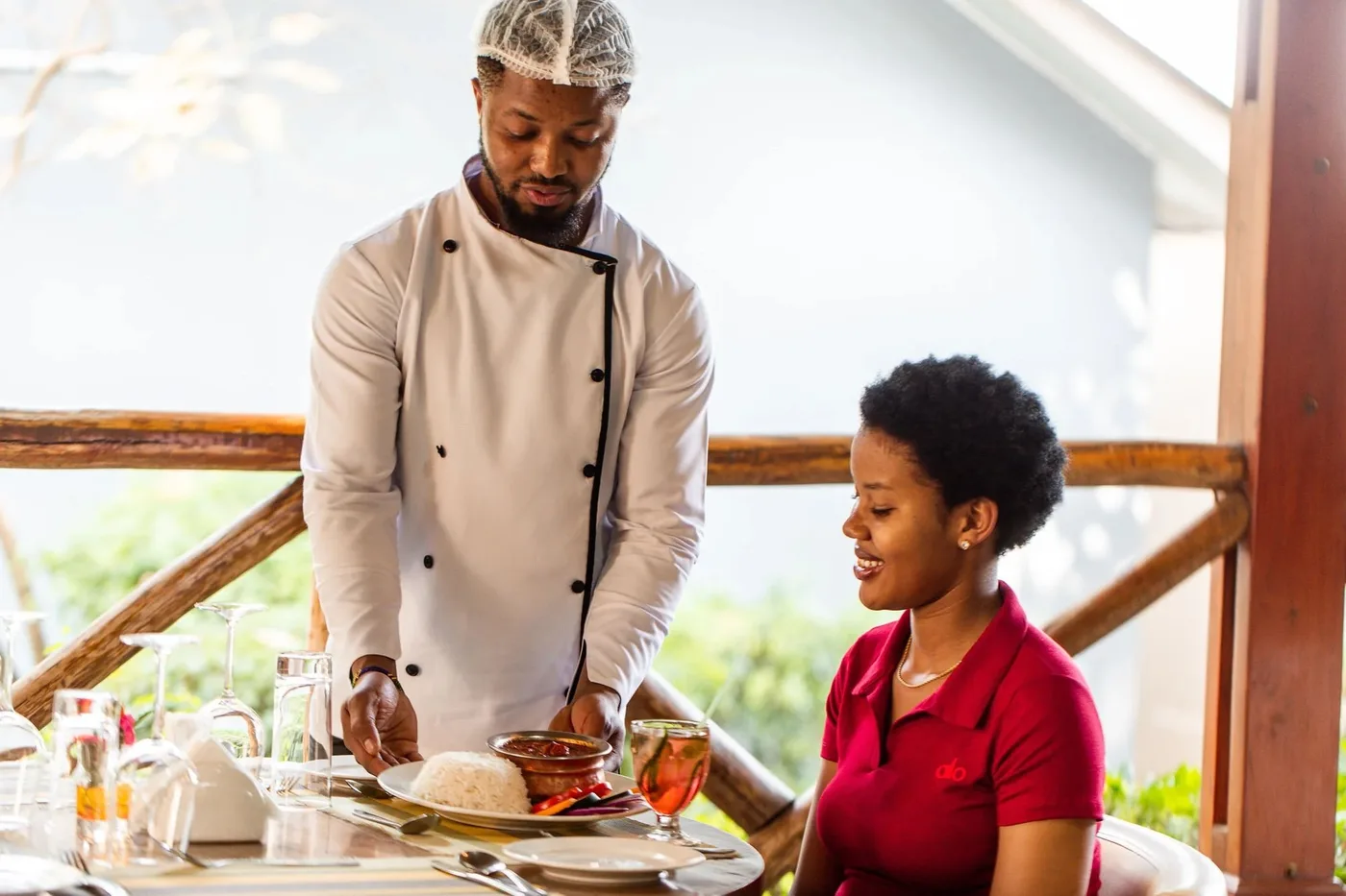 Chef serving a guest
