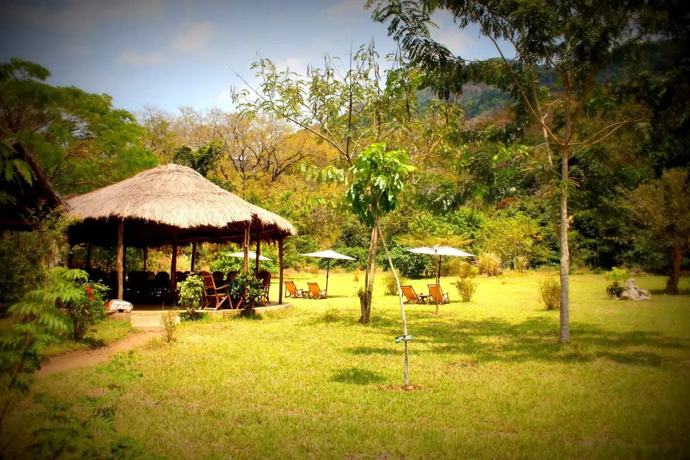 Lodge grounds and thatched shade