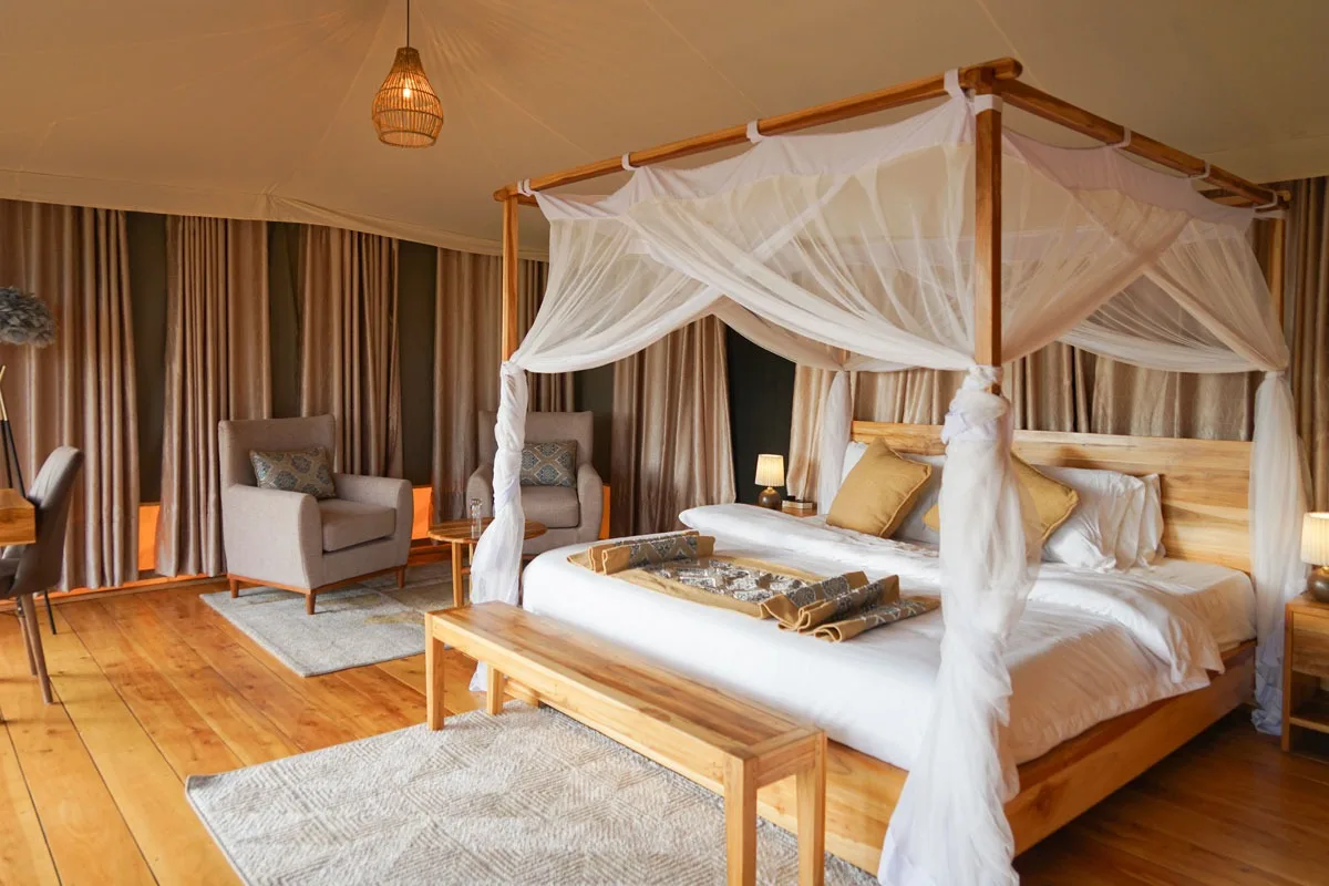 Tent with a canopied bed