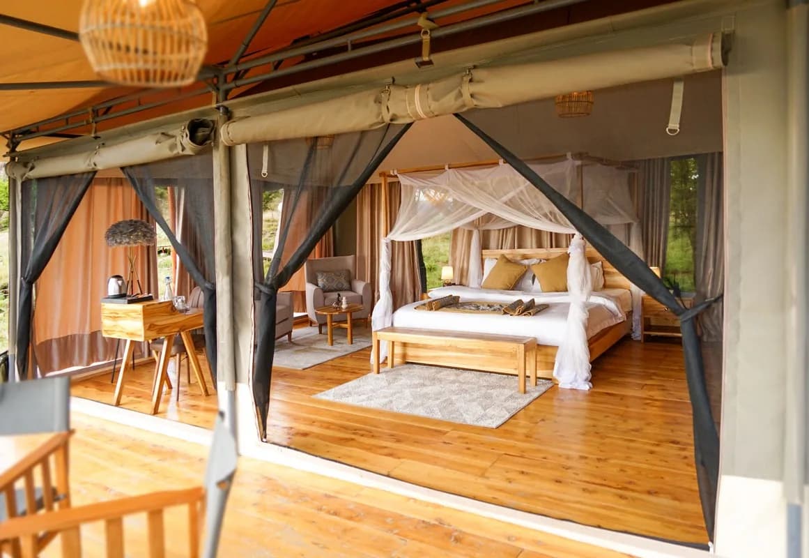 Inside a tent, open to the plains