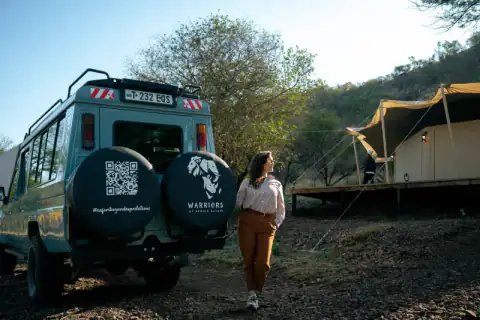 Walking back to the vehicle past the tented camp
