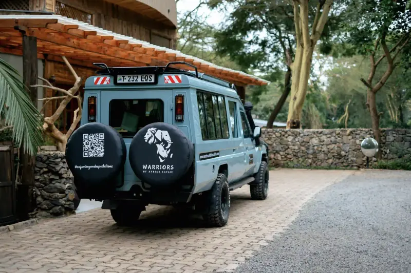 Branded Warriors of Africa safari vehicle rear view