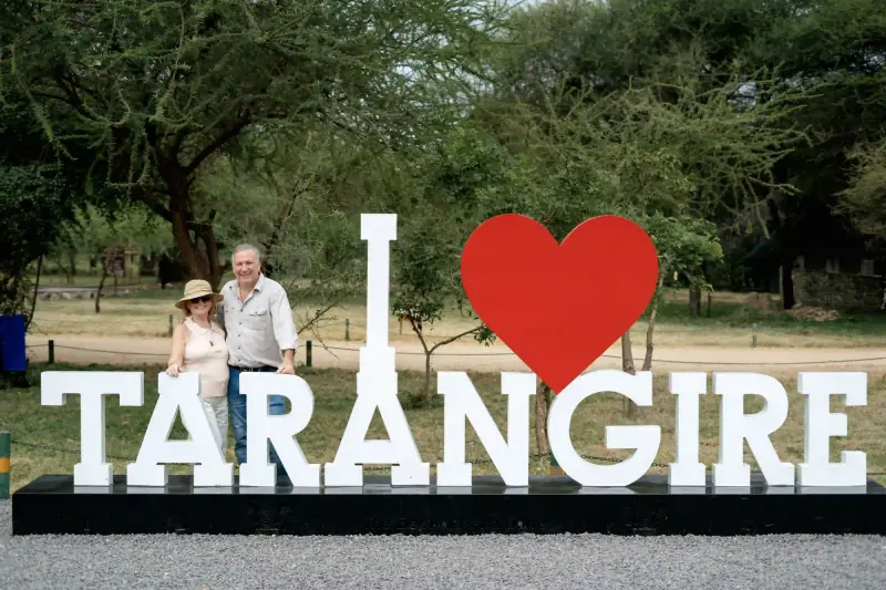 Couple at "I Love Tarangire" sign