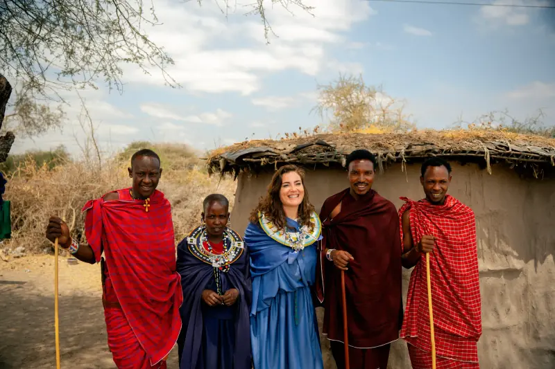 Group portrait with a Maasai family at their homestead