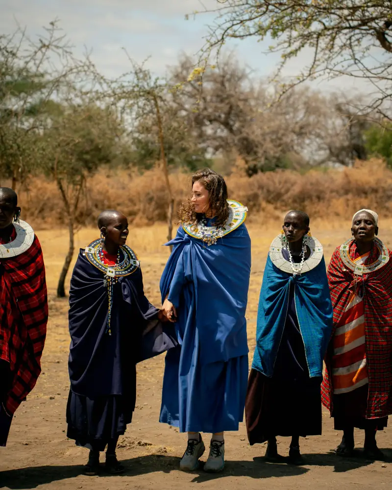 Laughing with Maasai women in beaded jewellery