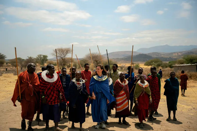 Warriors singing around the guest in the clearing