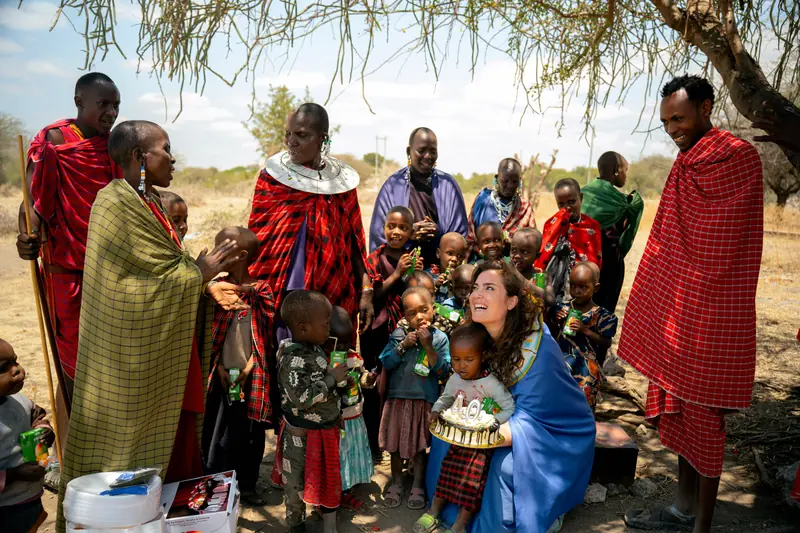 Handing out supplies to the village children