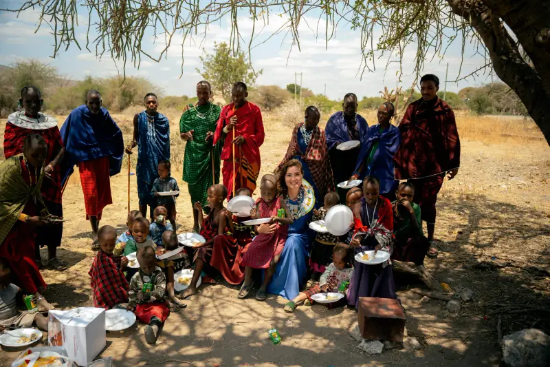 Village lunch laid out on the ground for the children