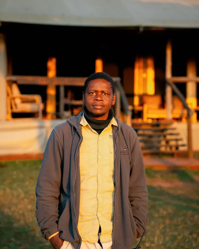 Portrait of a Warriors of Africa guide outside the lodge