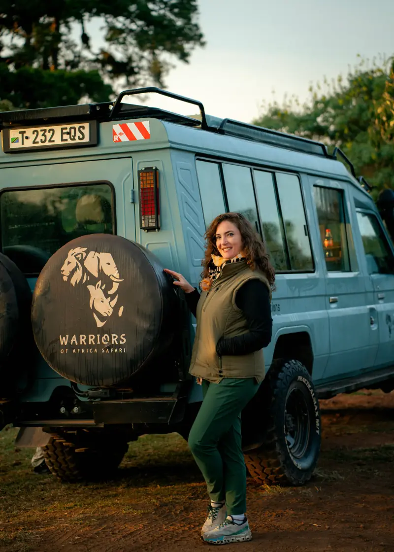 Guest leaning on the Warriors of Africa spare wheel