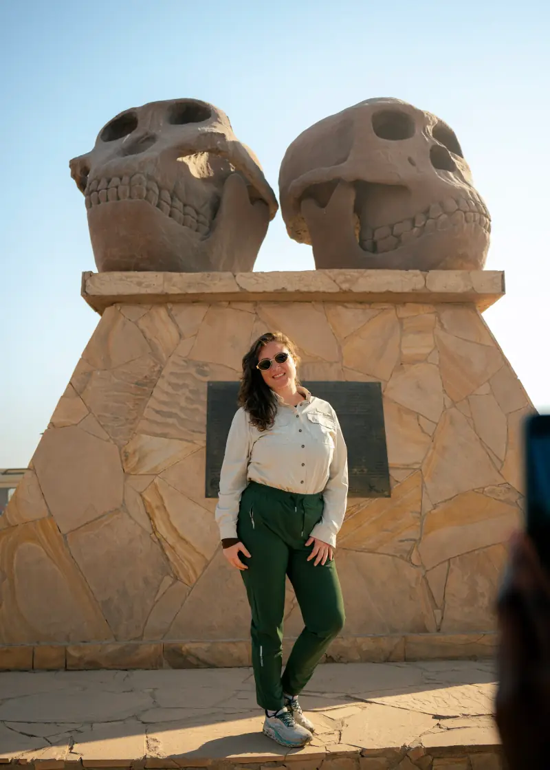 Guest at the Serengeti gate monument
