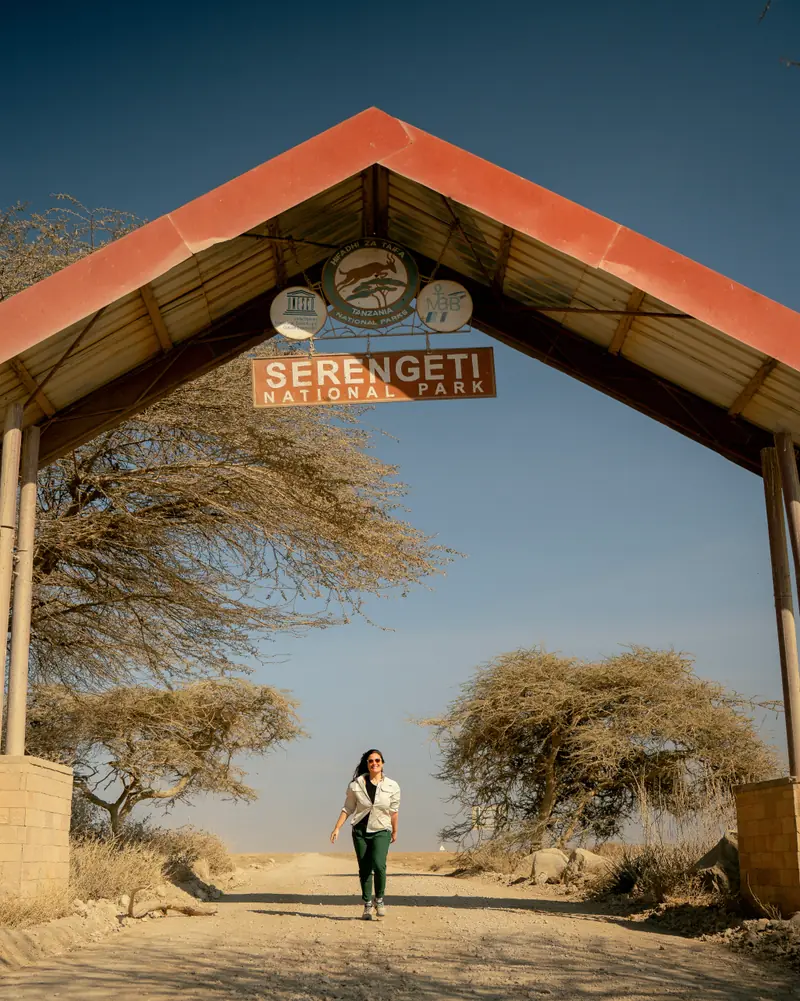 Standing under the Serengeti gate arch
