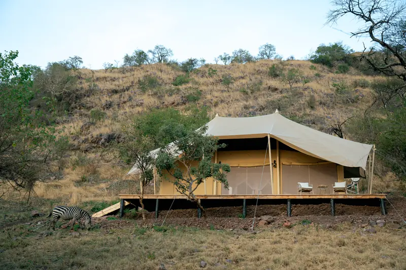Tented suite on its deck above the valley