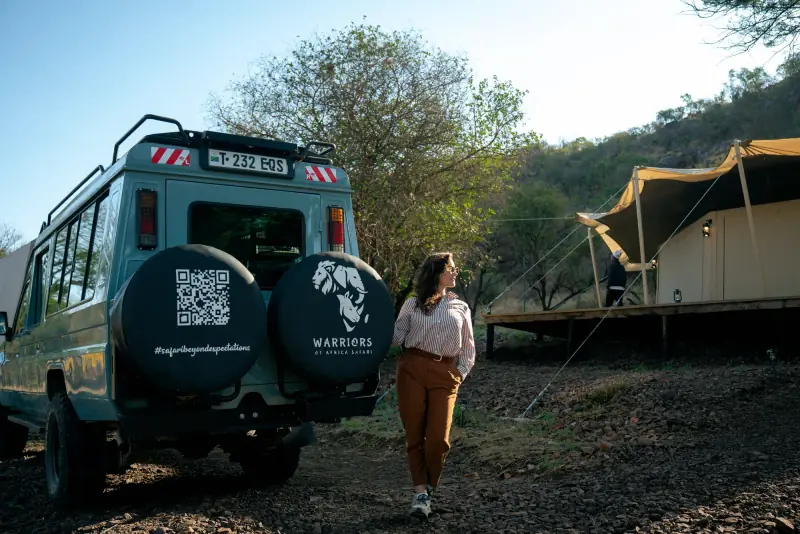 Walking back to the vehicle past the tented camp