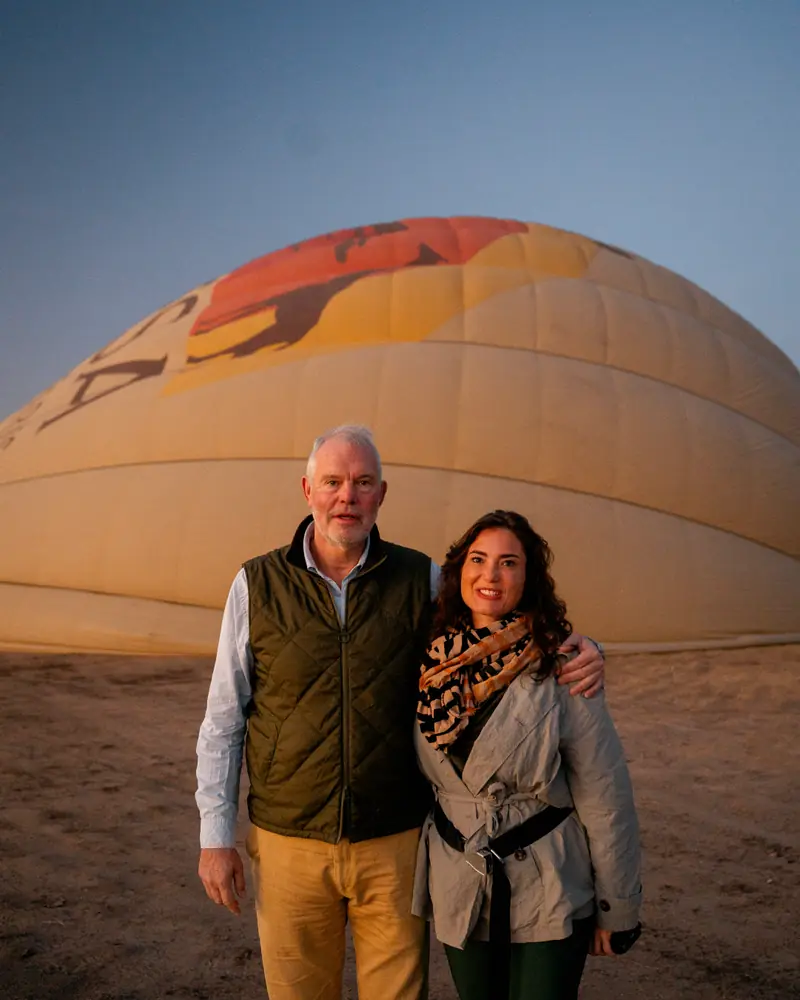 Couple before their sunrise balloon flight