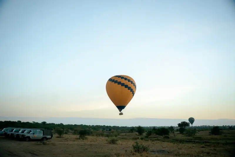 Hot-air balloon rising over the Serengeti