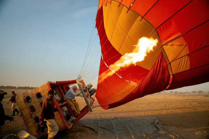 Balloon basket on its side as the envelope fills