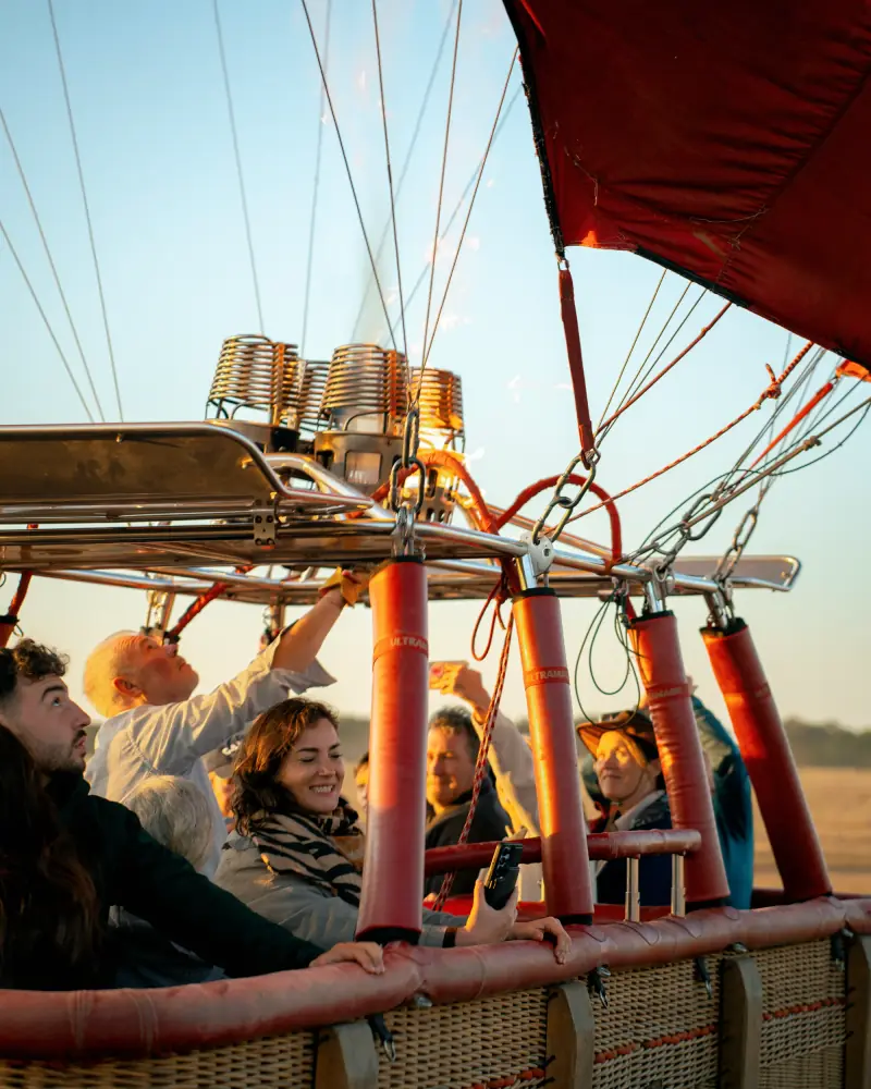 Passengers in the basket as the balloon lifts