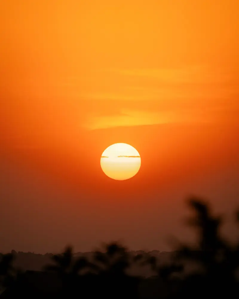 Full sun low over the Serengeti haze
