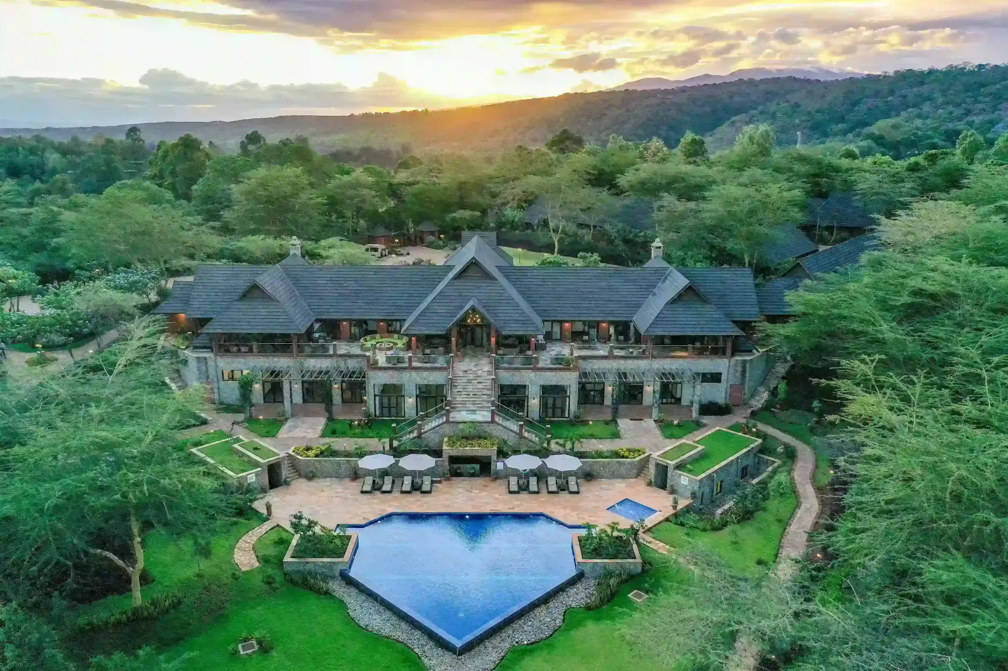 The lodge and pool at sunset